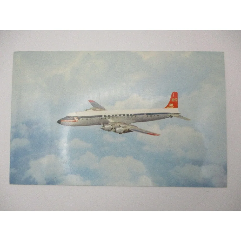 Vintage Northwest Orient‎ Airlines DC-7C Airplane Postcard Plastichrome P25100